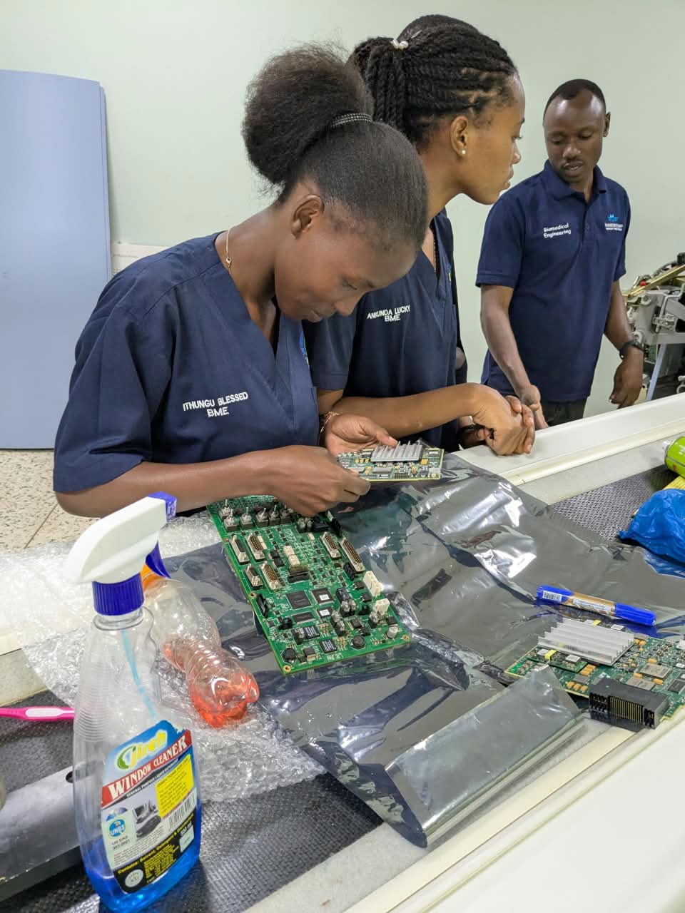 Engineers repairing equipment