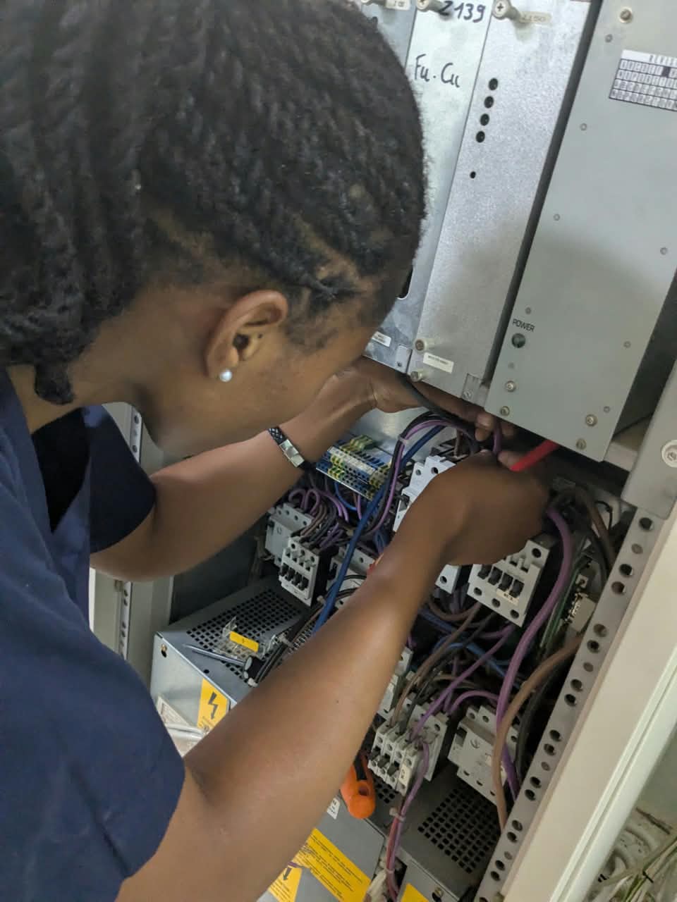 Engineers repairing equipment